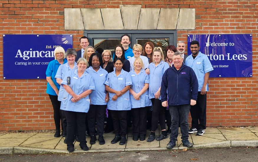 Colour image of the care team at the front of Norton Lees Care Home in Sheffield