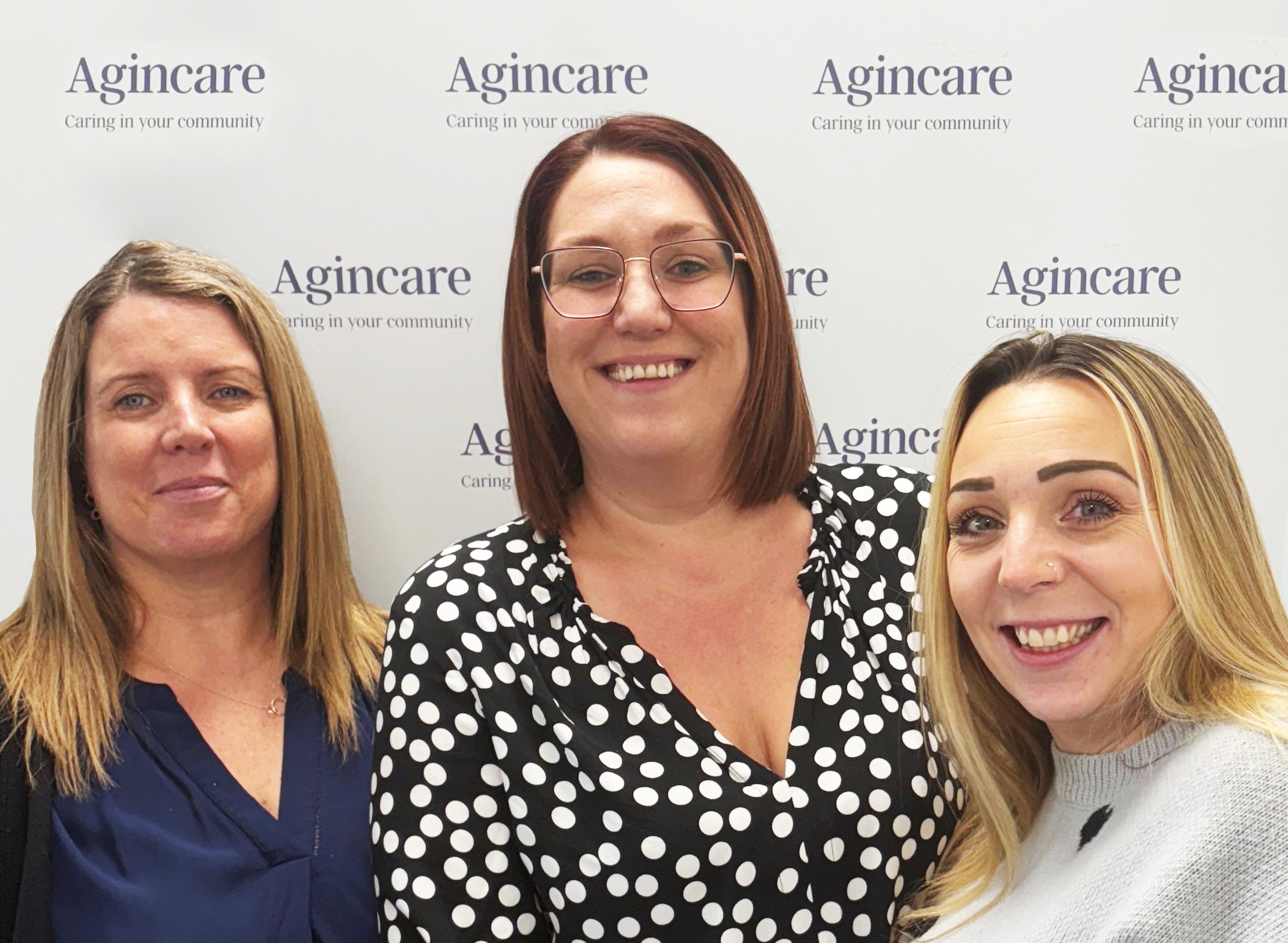 Colour Image of the Agincare live-in care office in team in their office in Woking