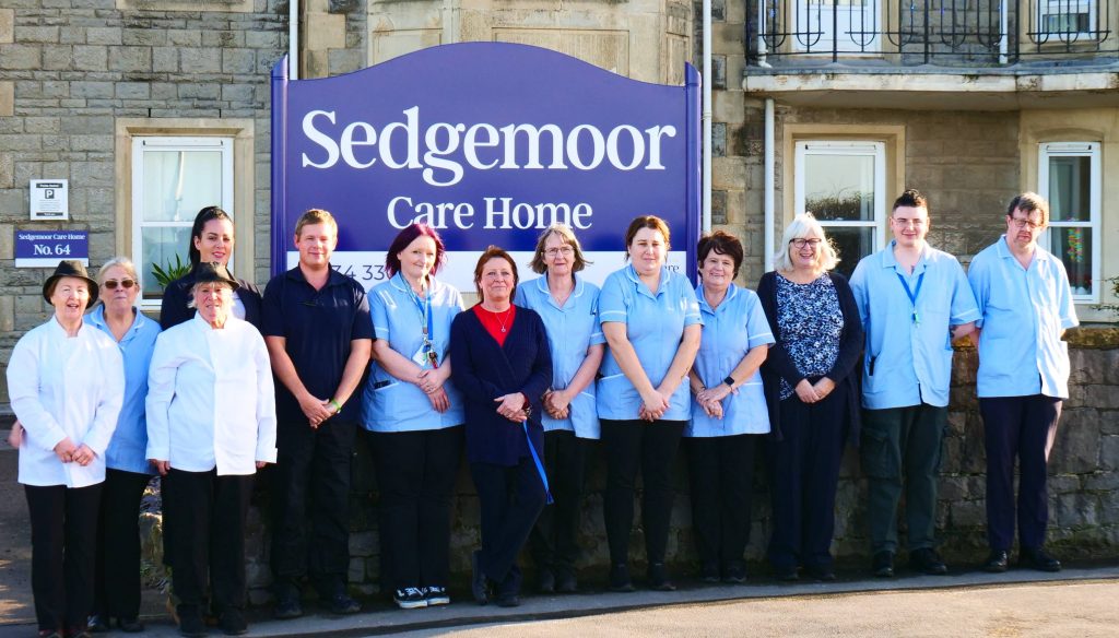 Picture of the team outside Sedgemoor Care Home in Weston Super Mare